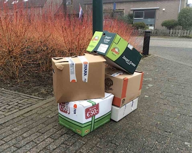 Oud papier huis aan huis in Grathem